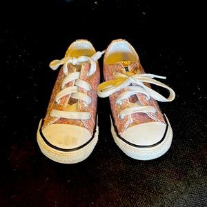 Pink and white converse